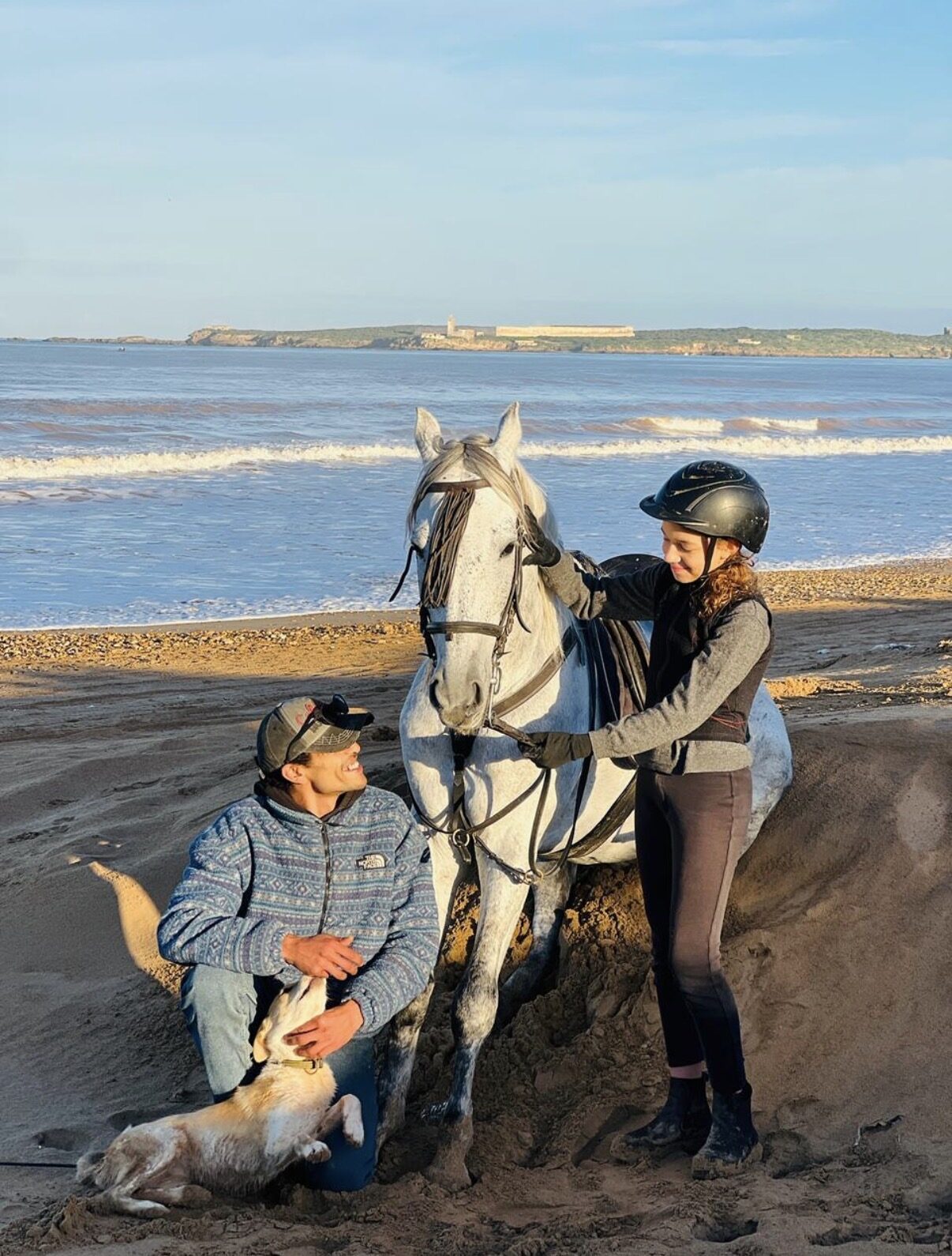 Hamza with a rider and horse on the beach at Essaouira